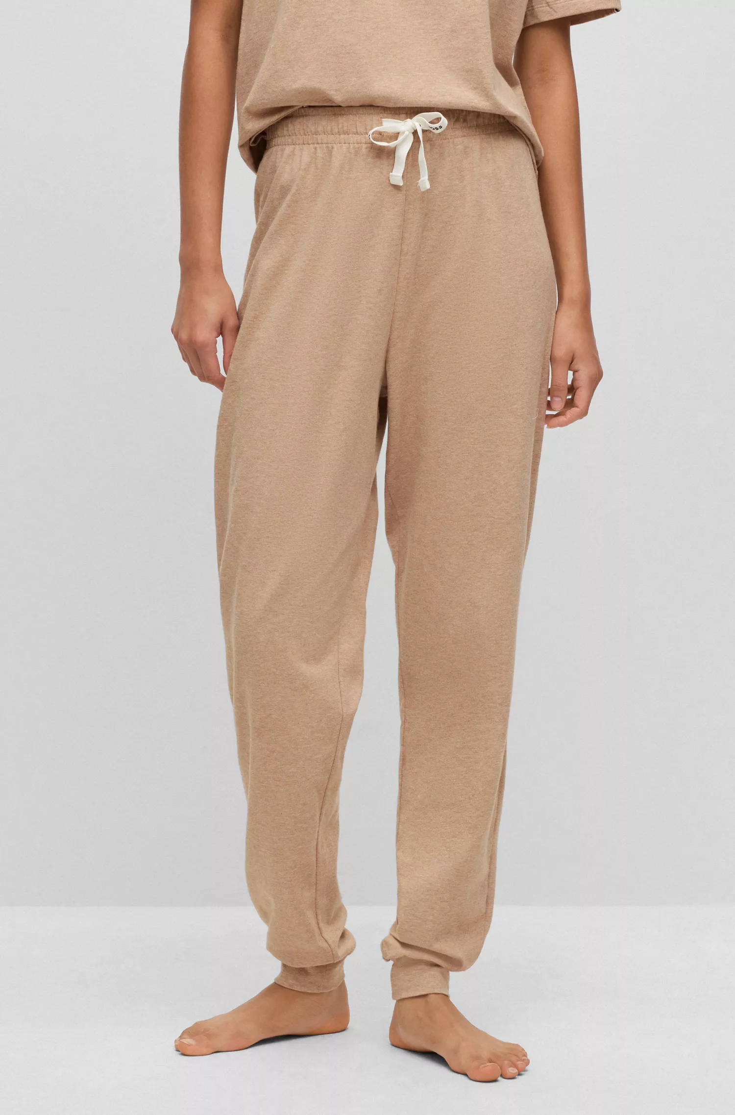 Calça de pijama BOSS preta em algodão elástico com cordões personalizados.