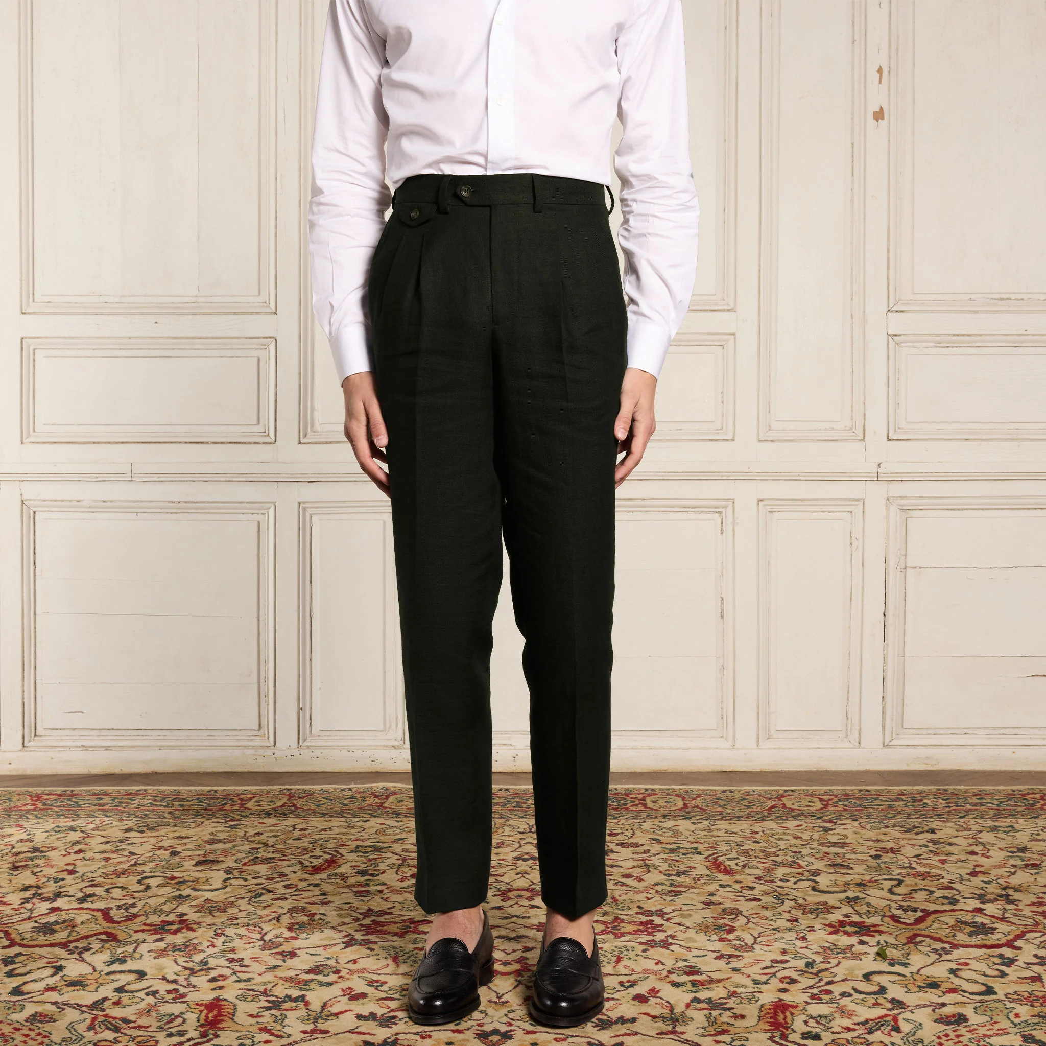 Double-pleated green linen pants