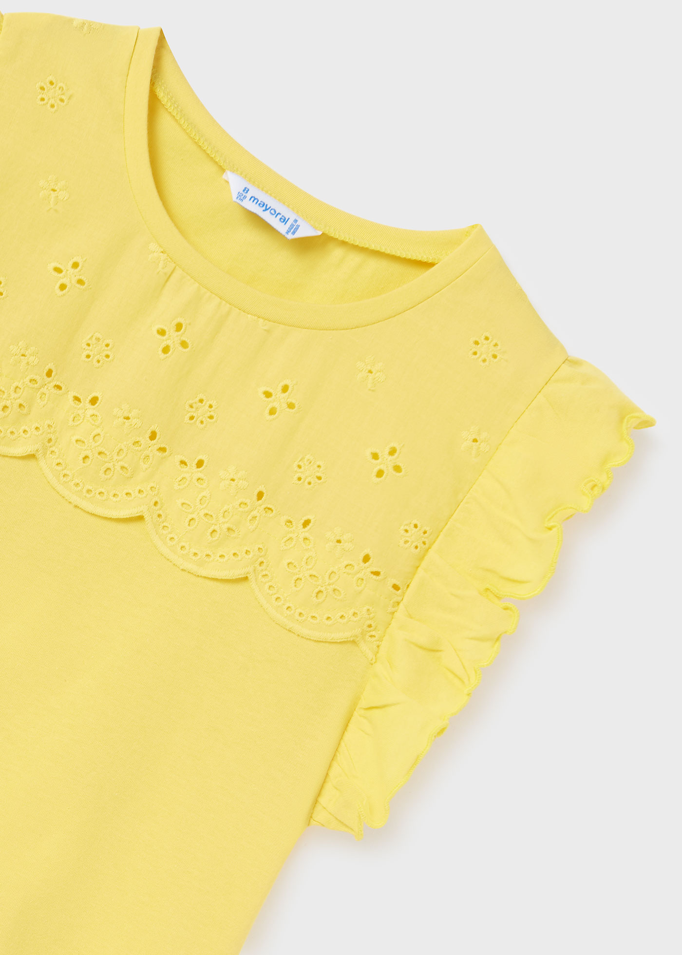 Camiseta regata feminina com babados, feita de algodão sustentável.