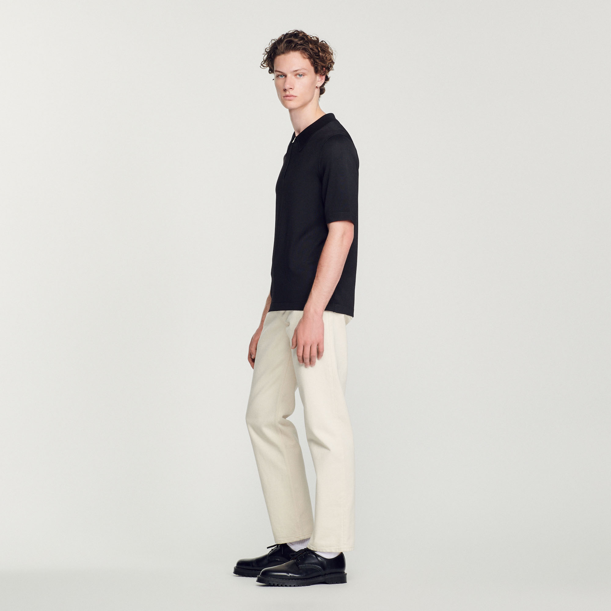 Polo en maille á col zippe