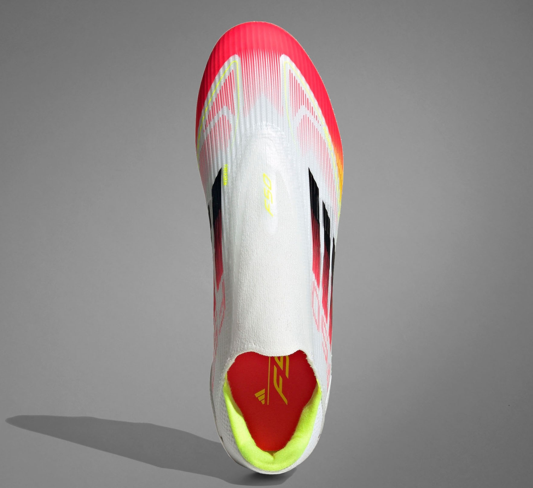 F50 League LL FG/MG Cloud White/Core Black/Solar Yellow