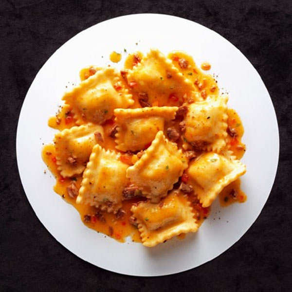 Les raviolis au confit de canard et sauce bolognaise