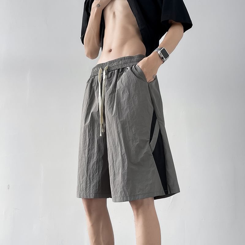 Hushgrain - Tweekleurige shorts met wijde pijpen en trekkoord in de taille