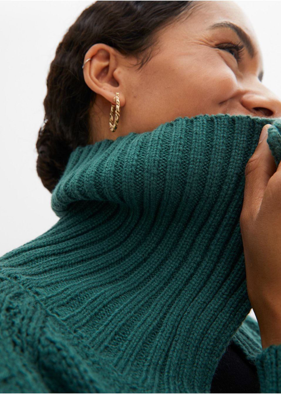 Veste longue en maille torsadée