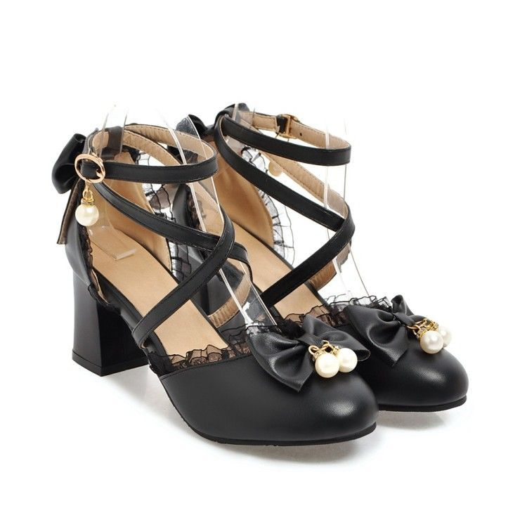 Freesia - Pumps met blokhak en kanten rand en lintaccent