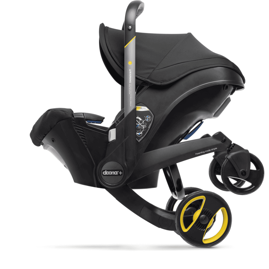 doona Babyschale Nitro Black  schwarz mit voll integriertem Fahrgestell, 2 in 1