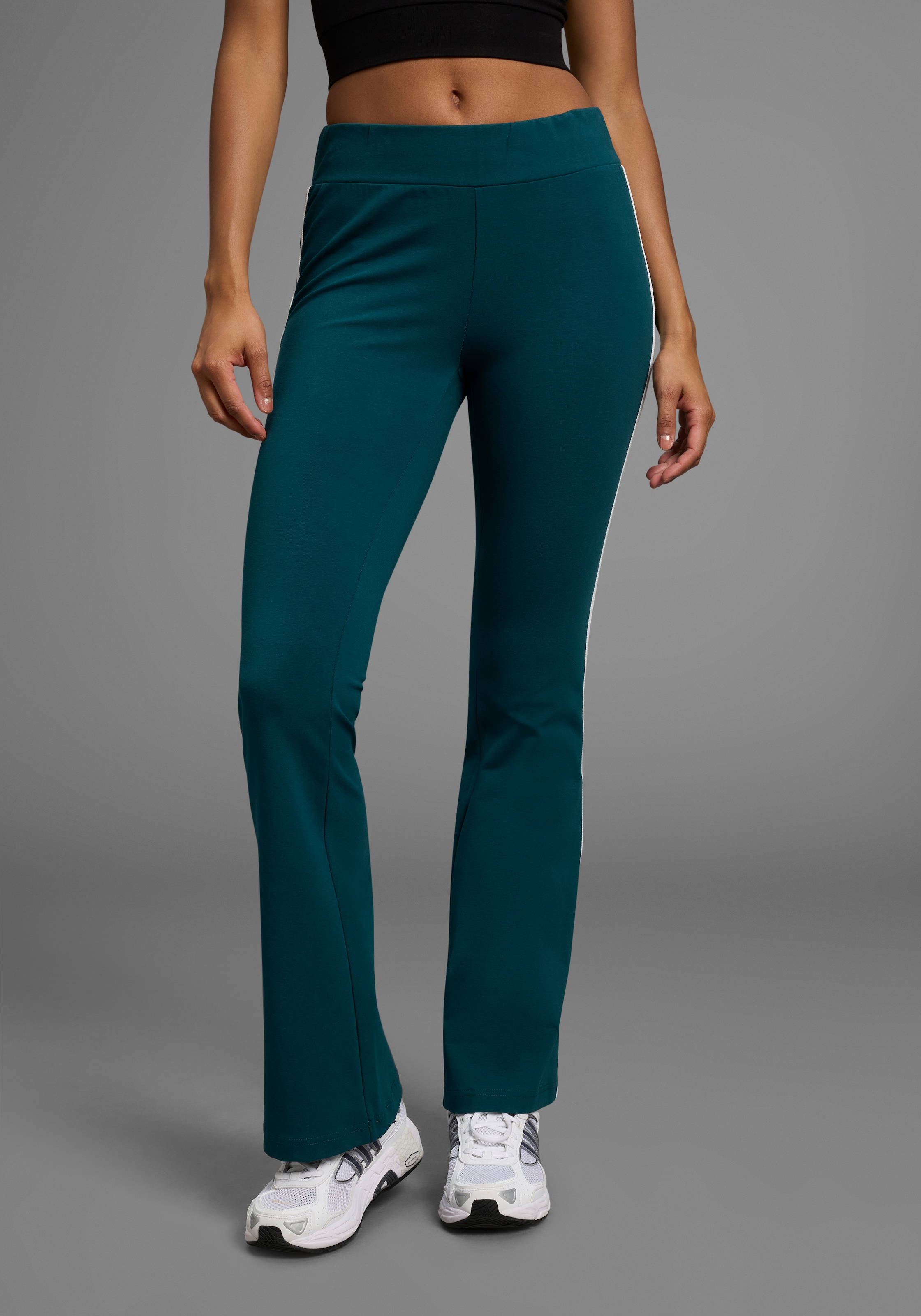 FAYN SPORTS Leggings  Logo als Reflektorprint