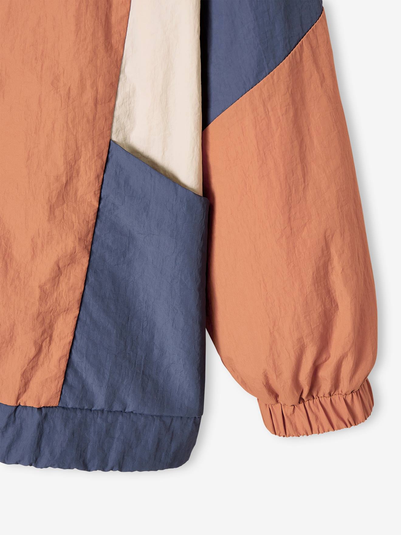 Jaqueta corta-vento laranja com efeito colorblock para meninos