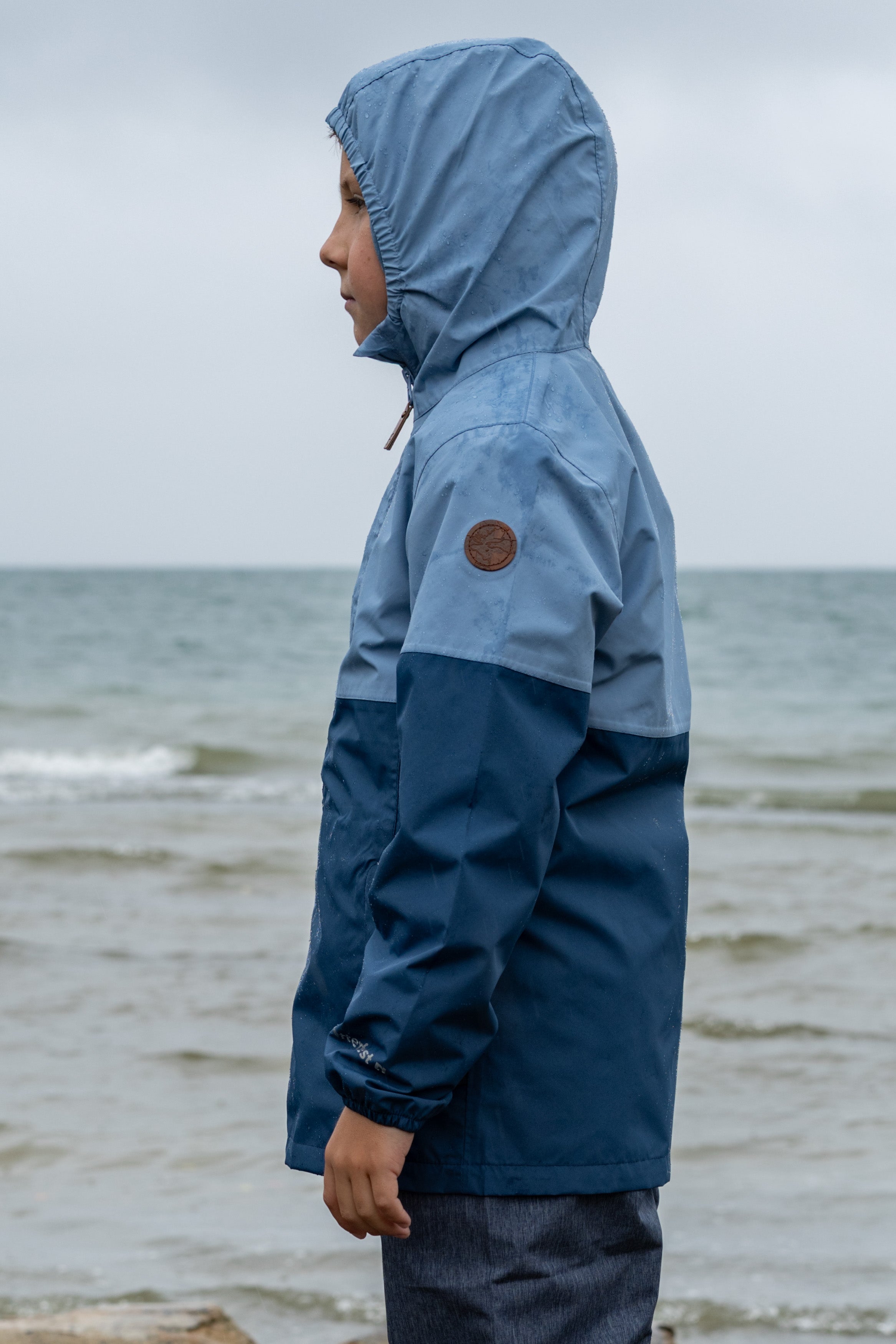 Kinder Regenjacke Travellight faded denim