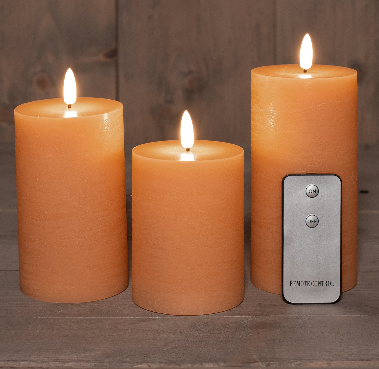 Anna's Collection LED kaars oranje met afstandsbediening D 7,5 H 10 / 12,5 / 15 cm 3 stuks