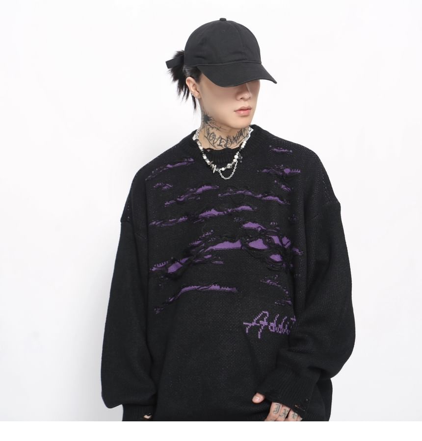 Derbundy - Oversized trui met ronde hals en distressed letters