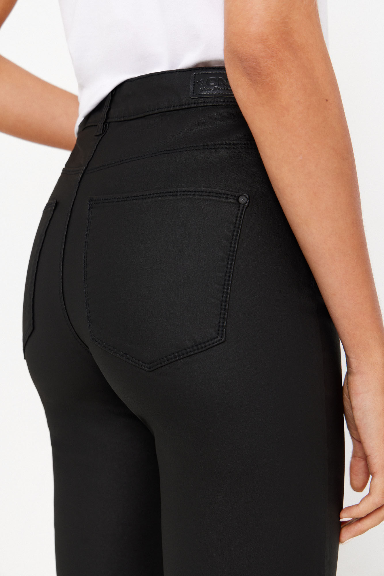 Calças skinny de couro sintético