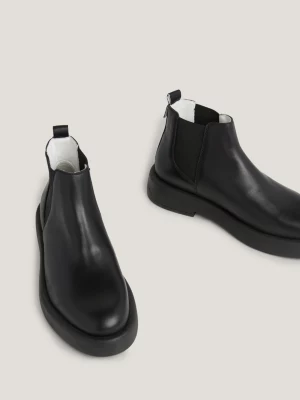 Botas Chelsea de cano médio em couro