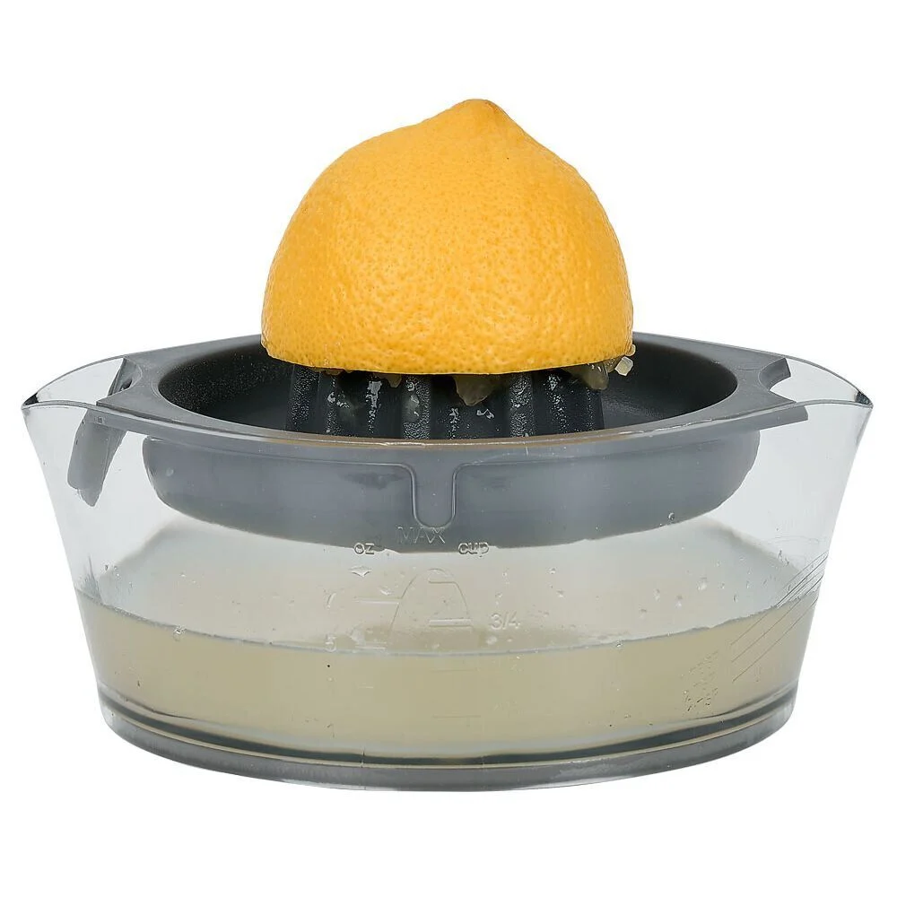 Presse agrumes avec réservoir transparent vert