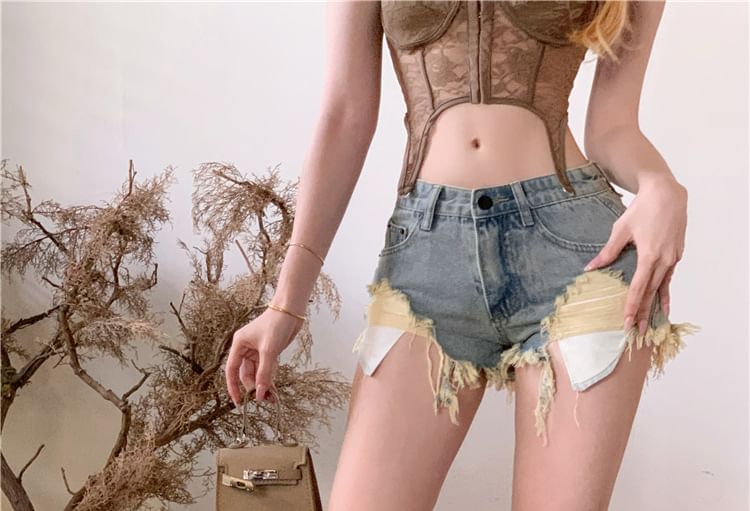 Chisan - Lage denim shorts met distressed effect