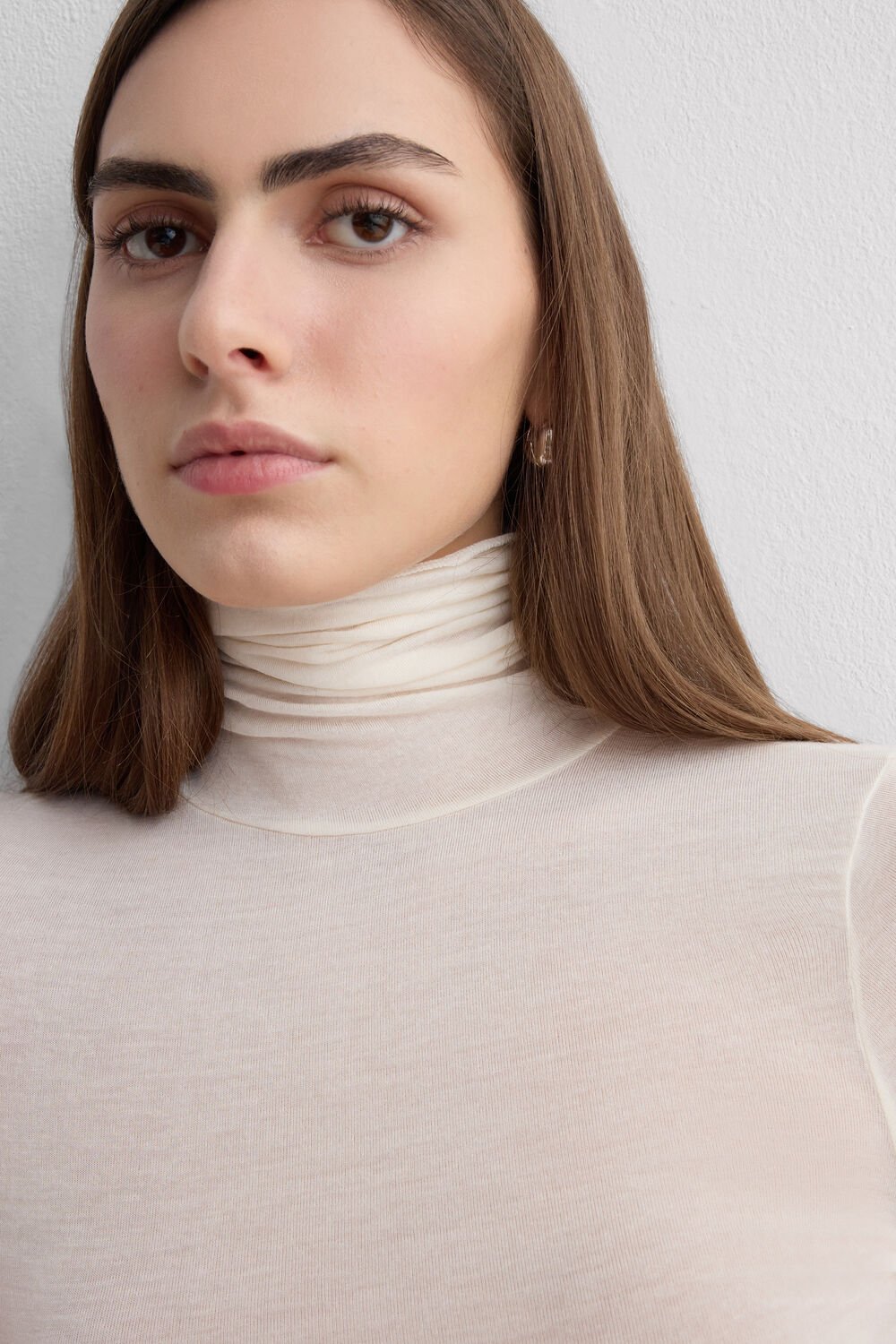 Body de gola alta em modal ultraleve com cashmere.