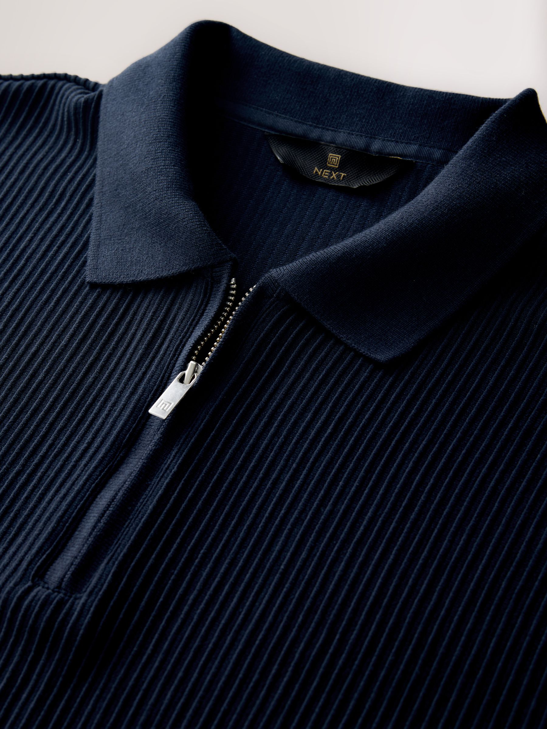 Donkerblauw - Smart poloshirt met textuur en rits