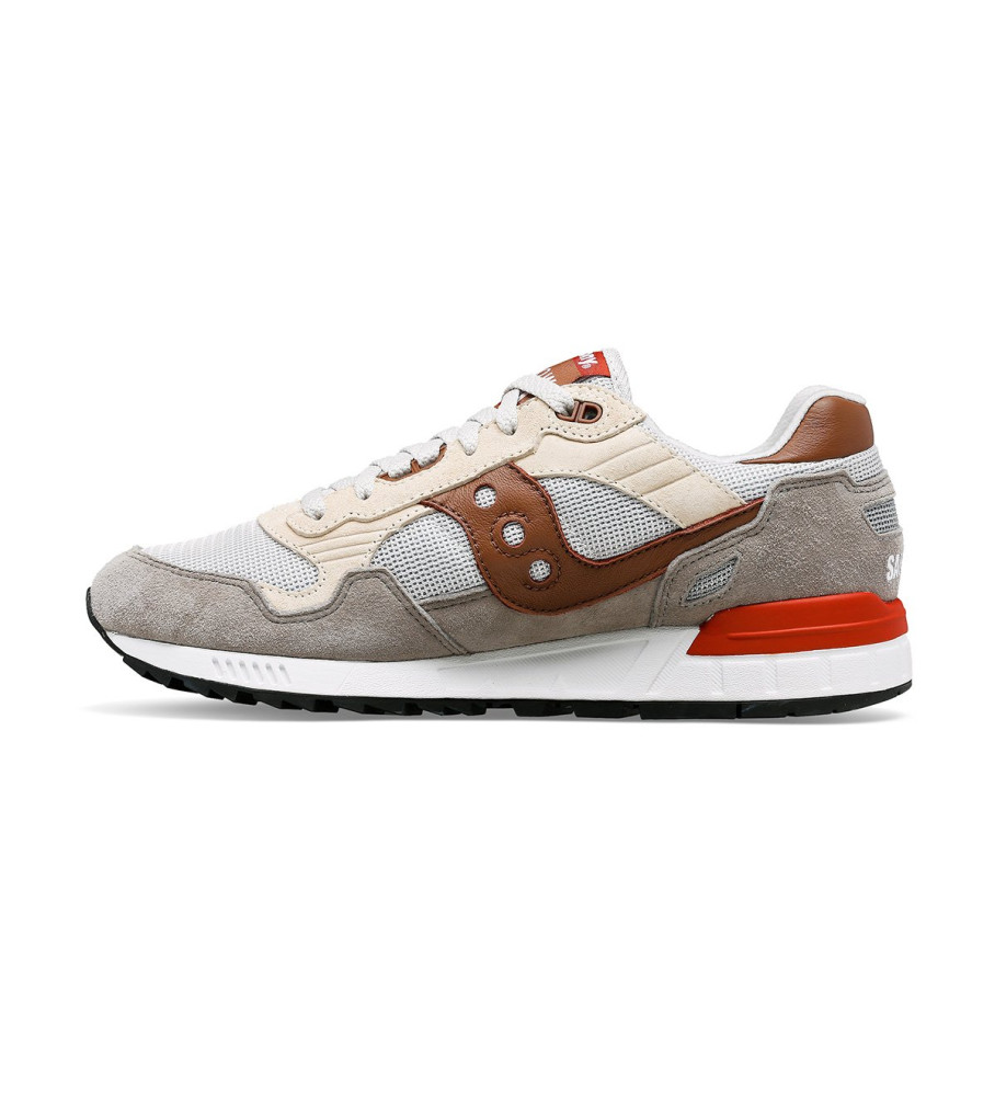 Tênis Saucony Shadow 5000 de couro, cinza e marrom.