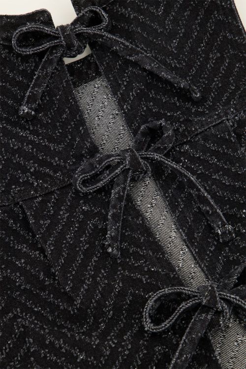 Zwarte jacquard denim top met strikjes