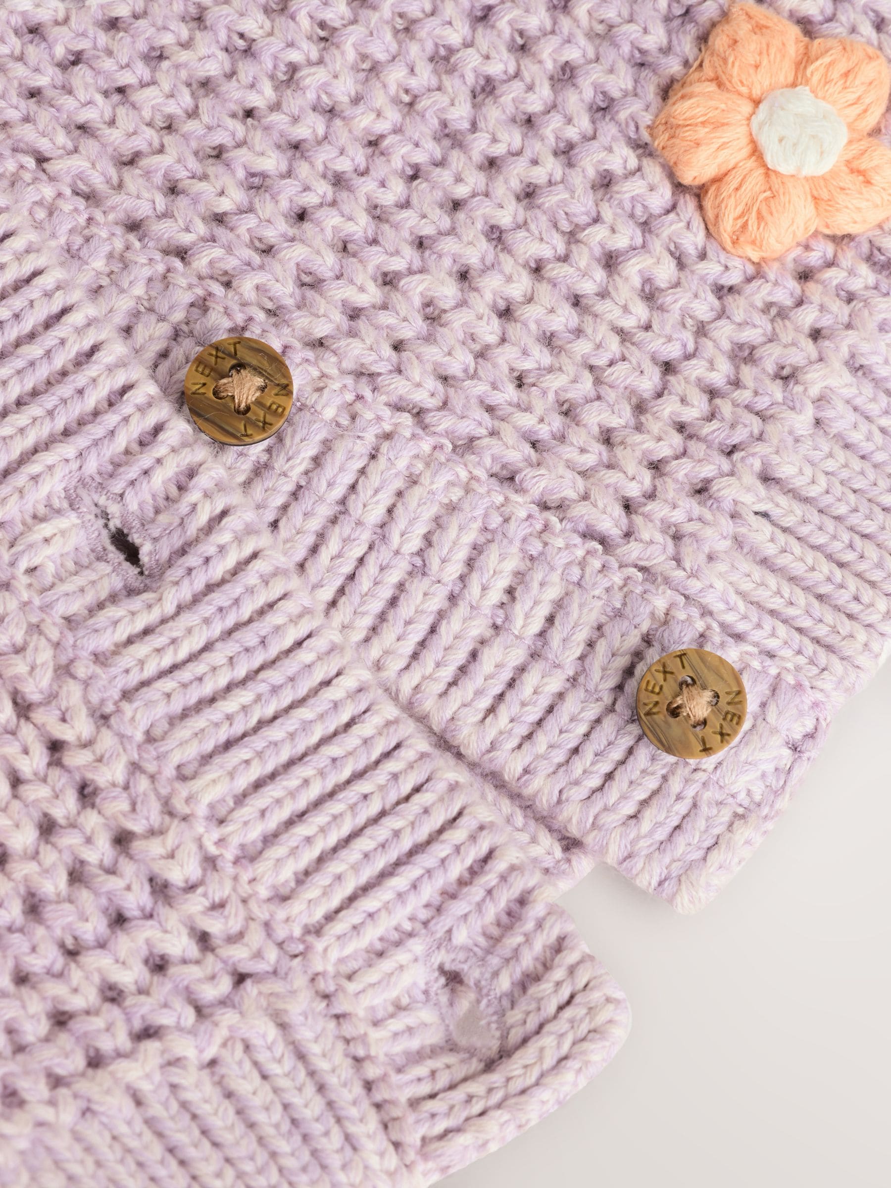 Paarse en abrikozenkleurige bloemen voor baby's - Geborduurd vest (0 mnd - 2 jr)
