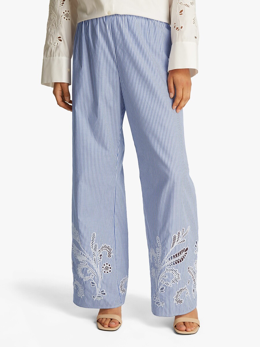 TOMMY HILFIGER<br>Calças de pernas largas com bordados