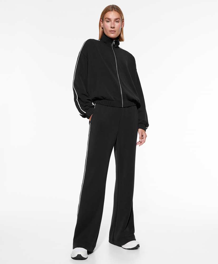 Calça flare em modal com aplique lateral