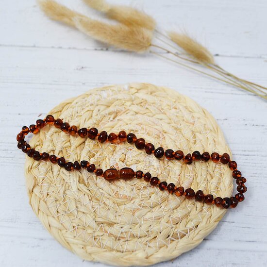 Collier Ambre bébé   Cognac        de               Irréversible
