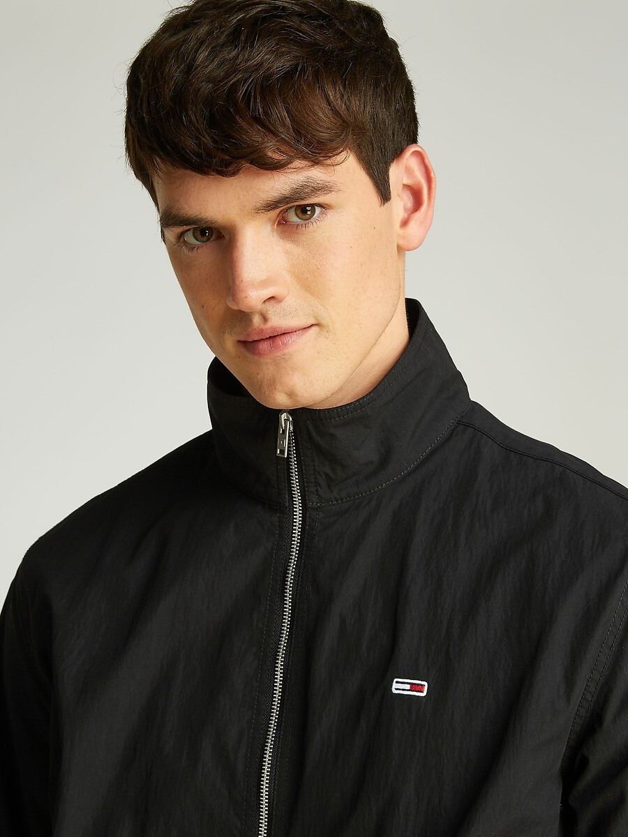 TOMMY JEANS<br>Jaqueta leve com zíper