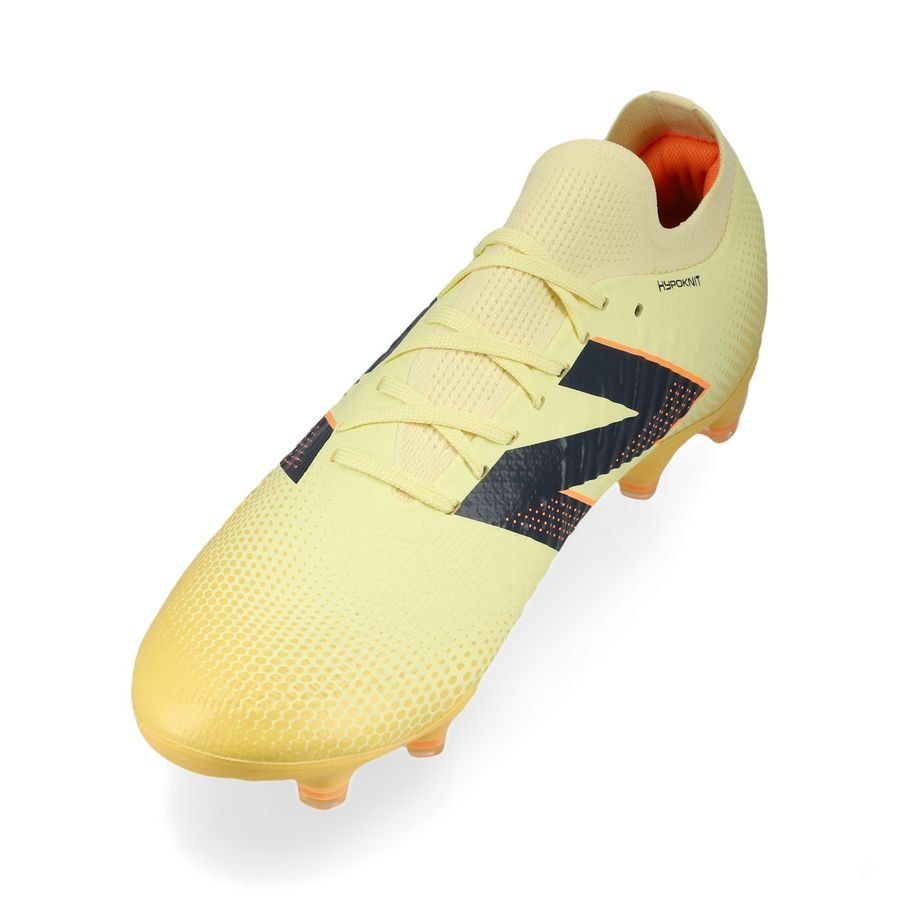 New Balance Tekela V4 Magia Low FG Energy Rush - Parchment/Noir/Orange