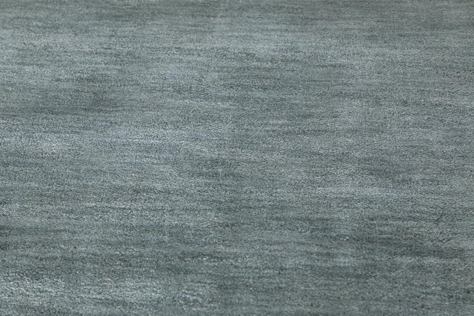Wilston gulvteppe 200x290 200x290 cm. Grønnfarget polyester håndtuftet.