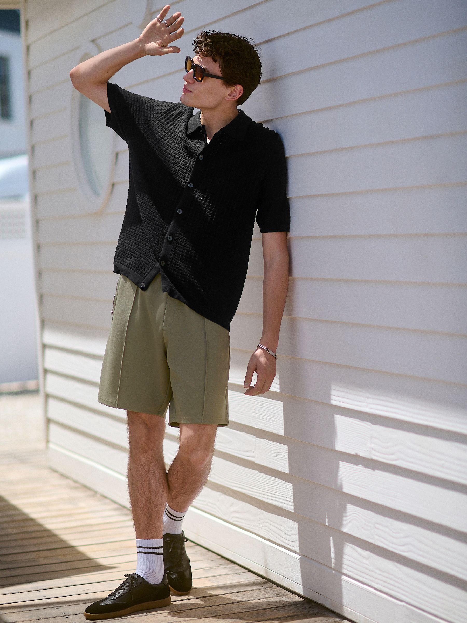 Kakigroen - Slim-fit jersey shorts met slimme ritszakken