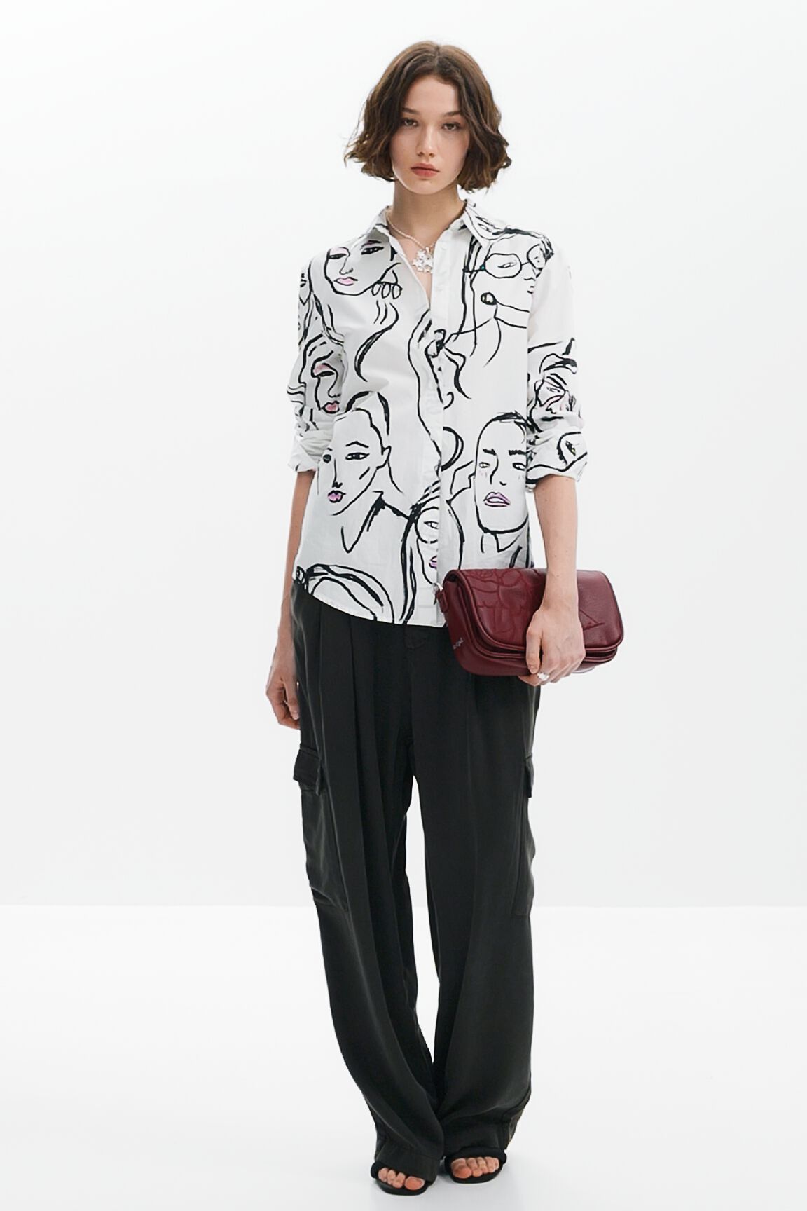 Camisa estampado caras