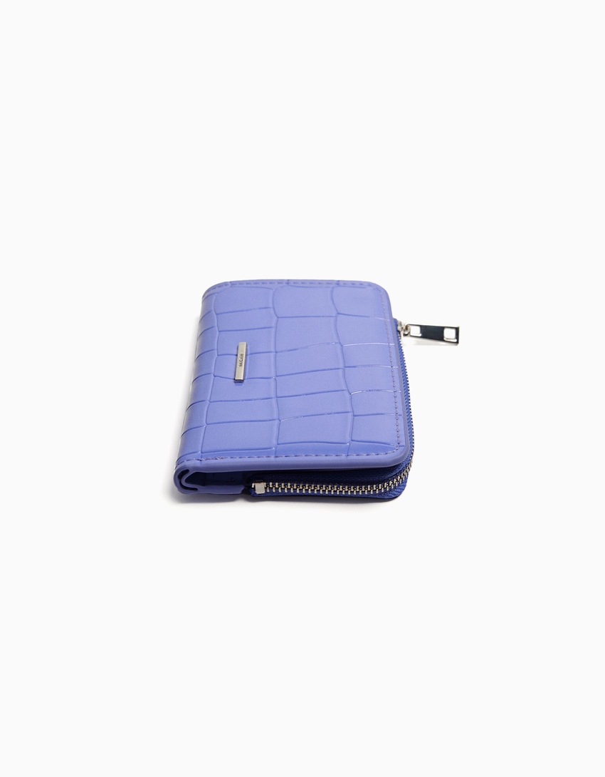 Bolsa com estampa animal em imitação de verniz em relevo
