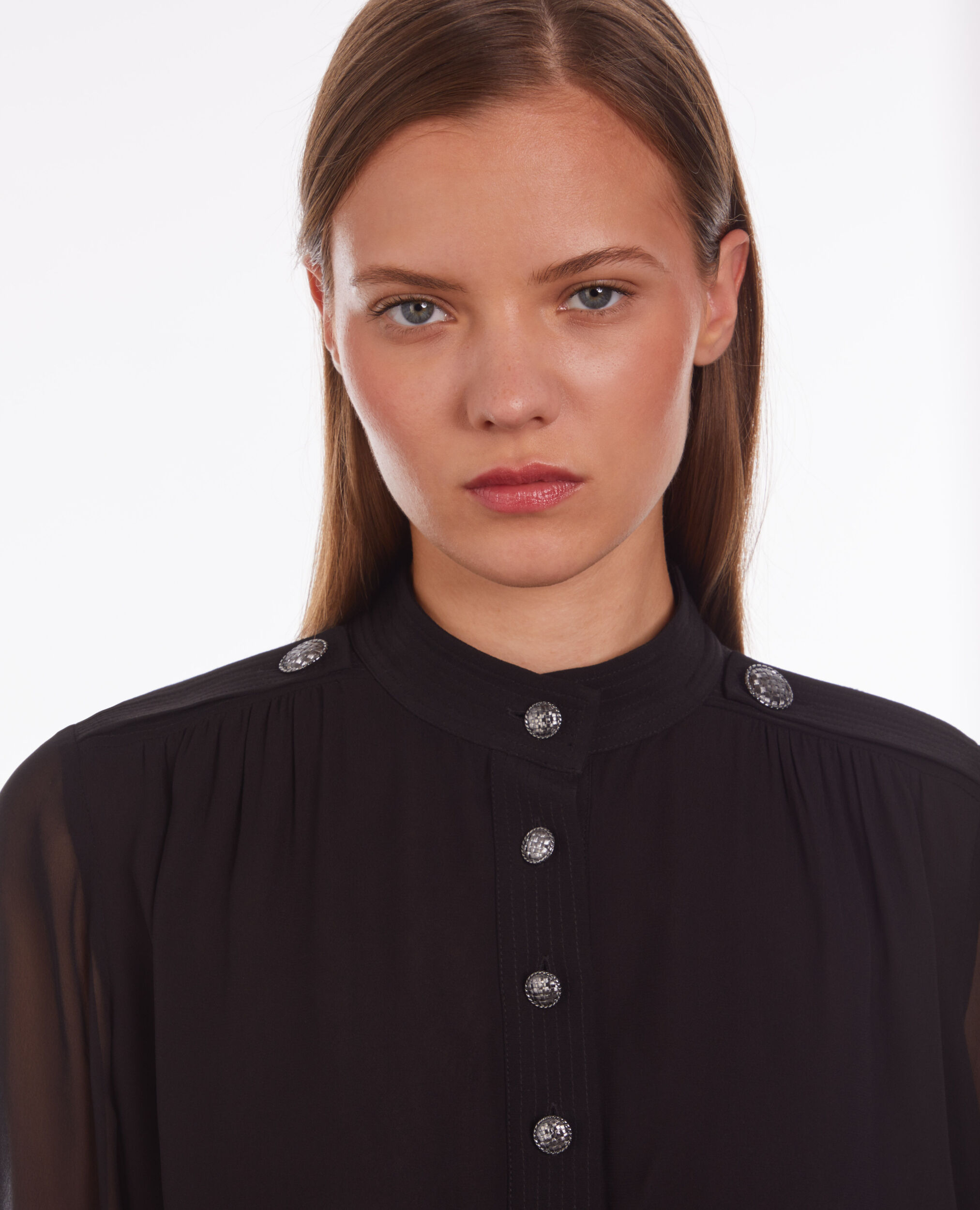 Top noir avec boutons bijoux