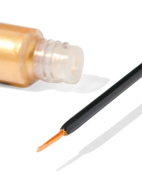 eyeliner pailleté doré