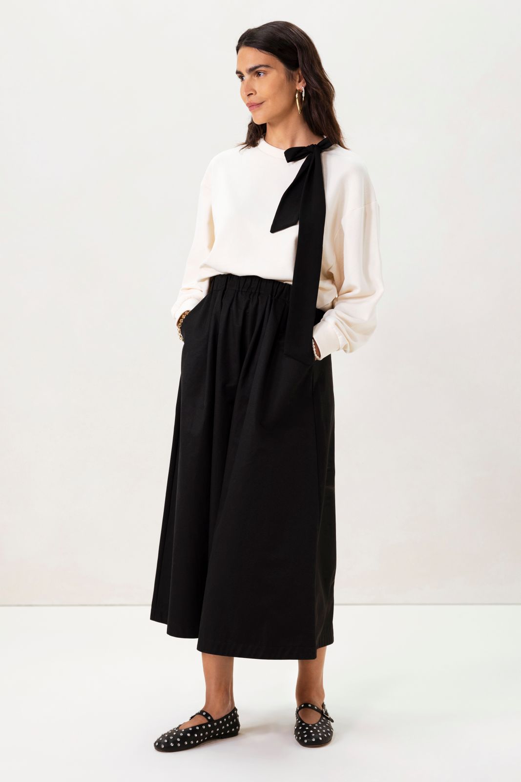 Witte sweater met strik