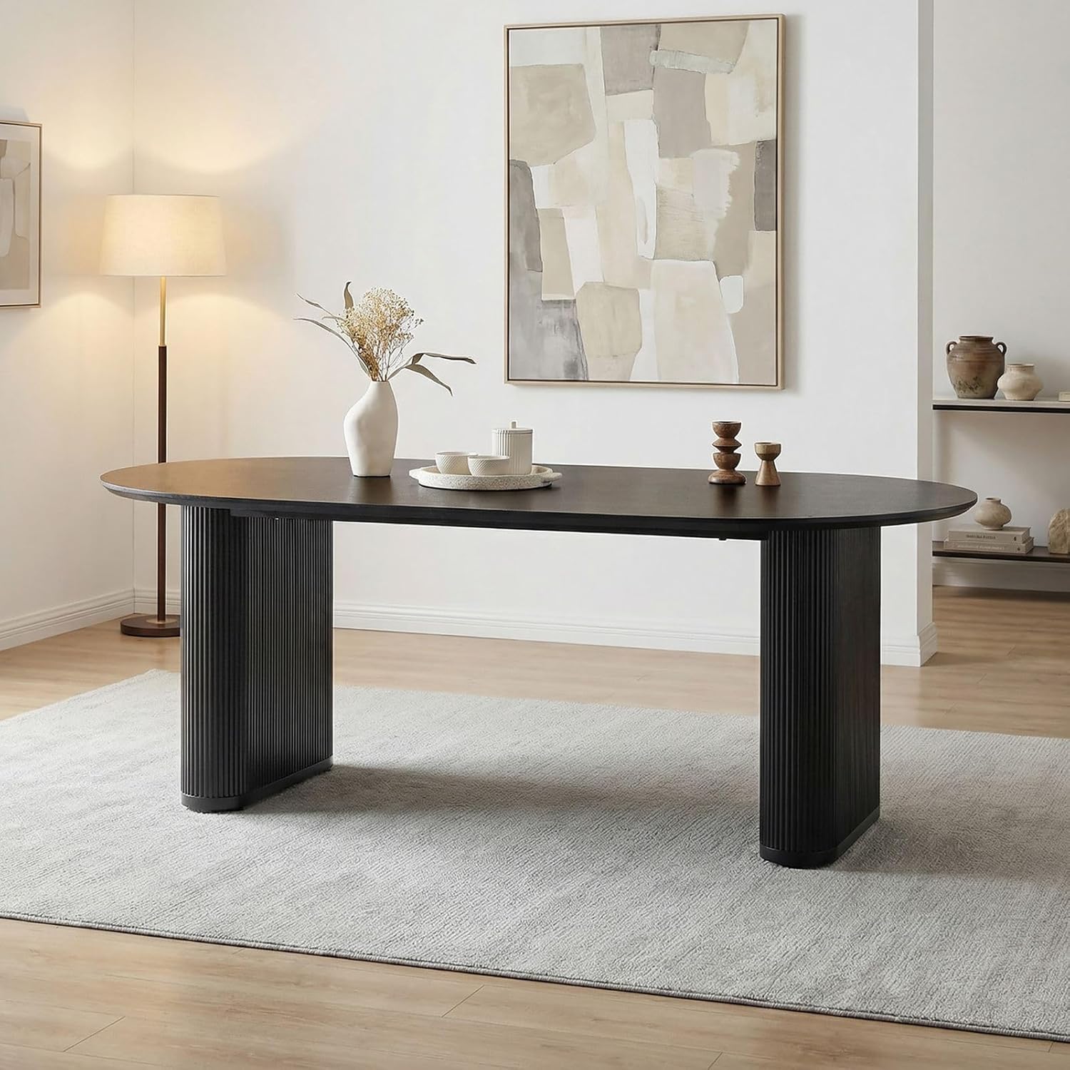 IDIMEX Esstisch Donovan 200x100 (BxT), Schwarz – ovaler Esszimmertisch mit modernen Tischbeinen aus Metall im Rillendesign, Tischplatte in schwarzer Holzoptik MDF