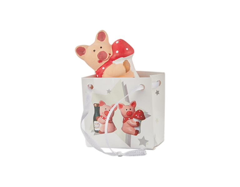Glücksfigur in Geschenktasche