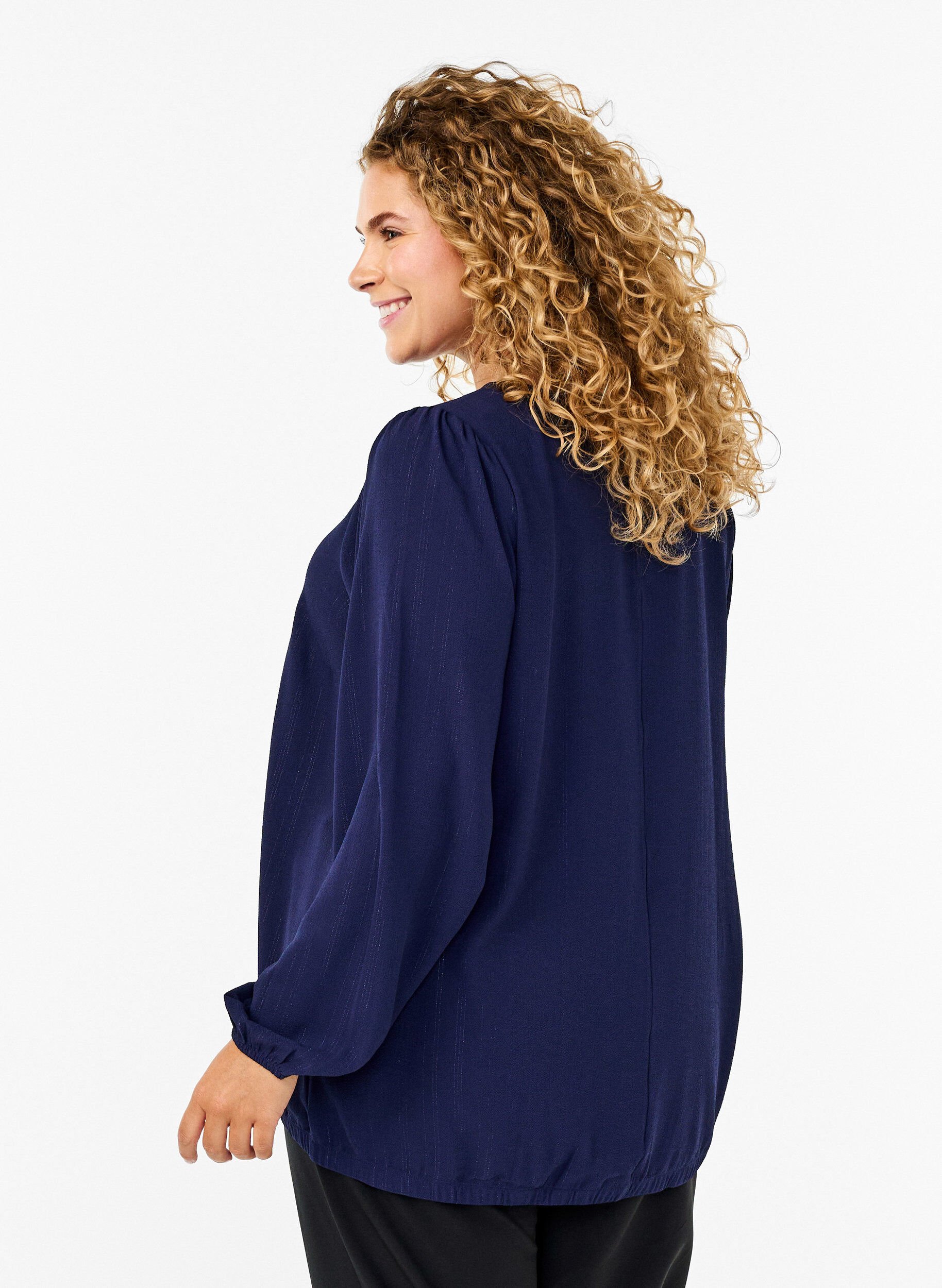 Bluse med sølv glimmer