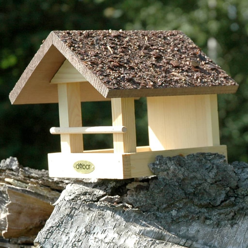 Mangeoire à oiseaux en forme de maison avec toit en écorce