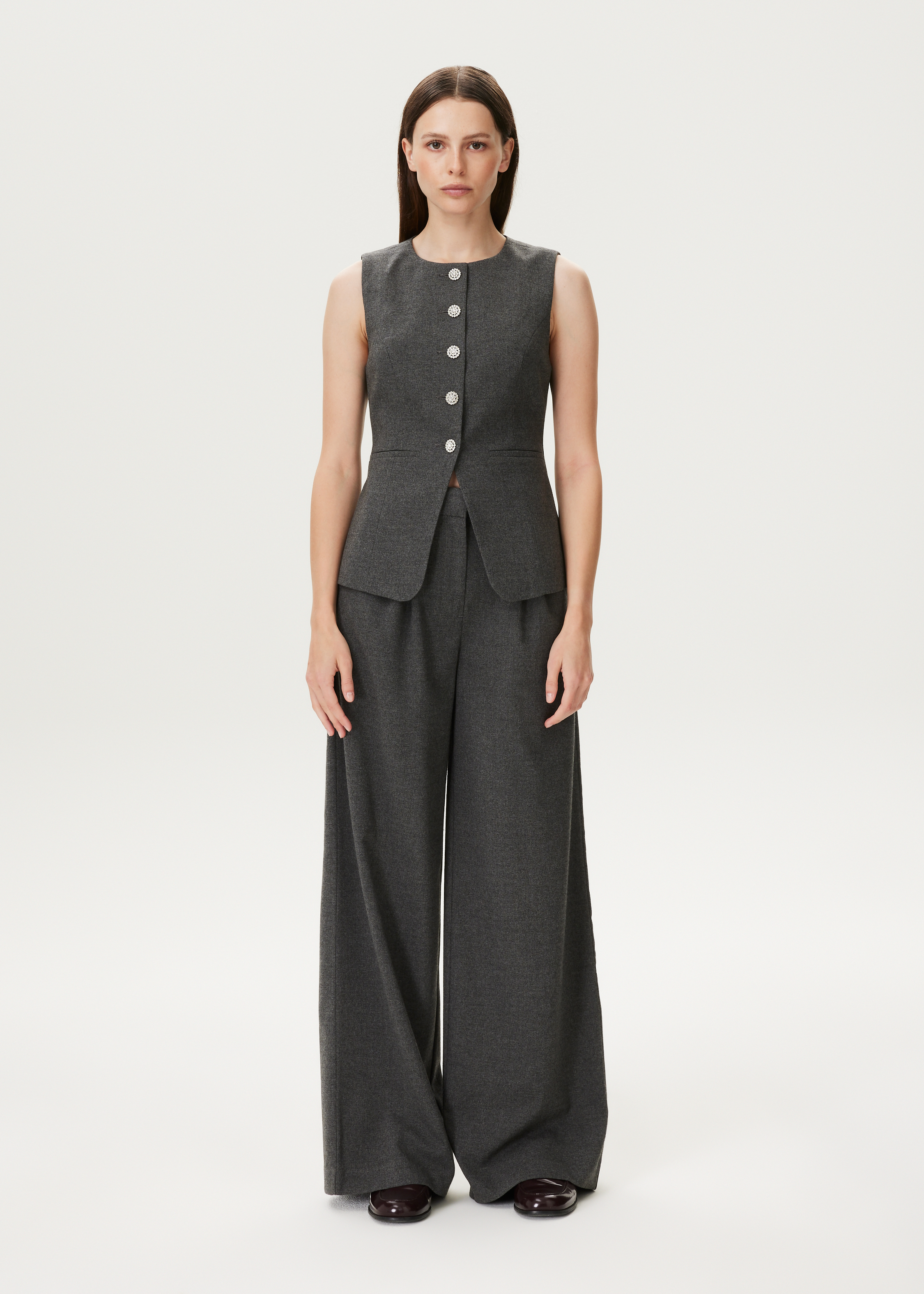 Melange gilet met sierknopen