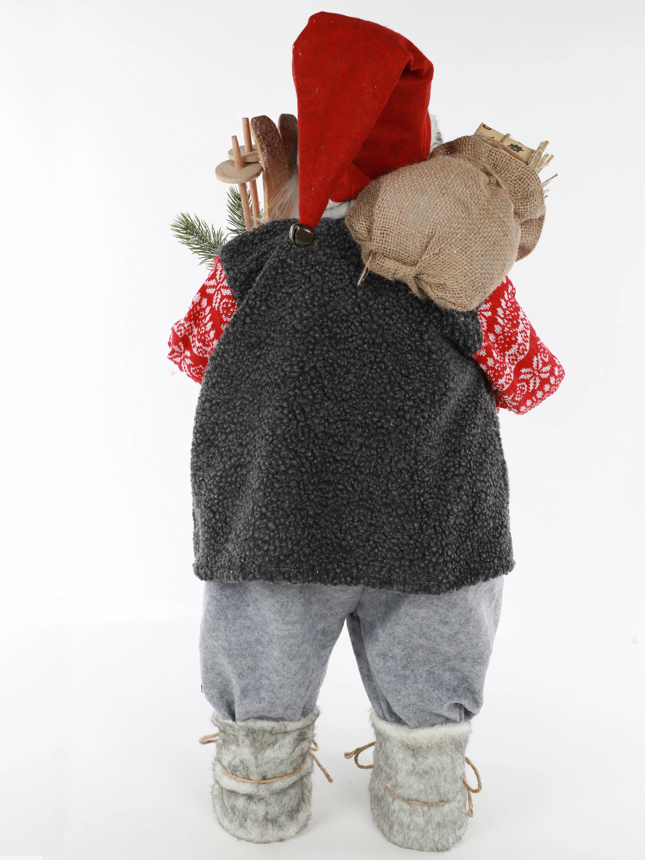 Weihnachtsmann stehendmit Skieern und Päckchen 60cm