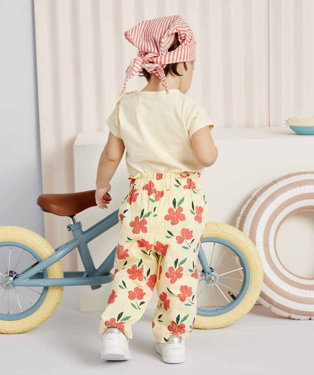 PANTALON FLUIDE BÉBÉ FILLE JAUNE EN COTON IMPRIMÉ AVEC FLEURS