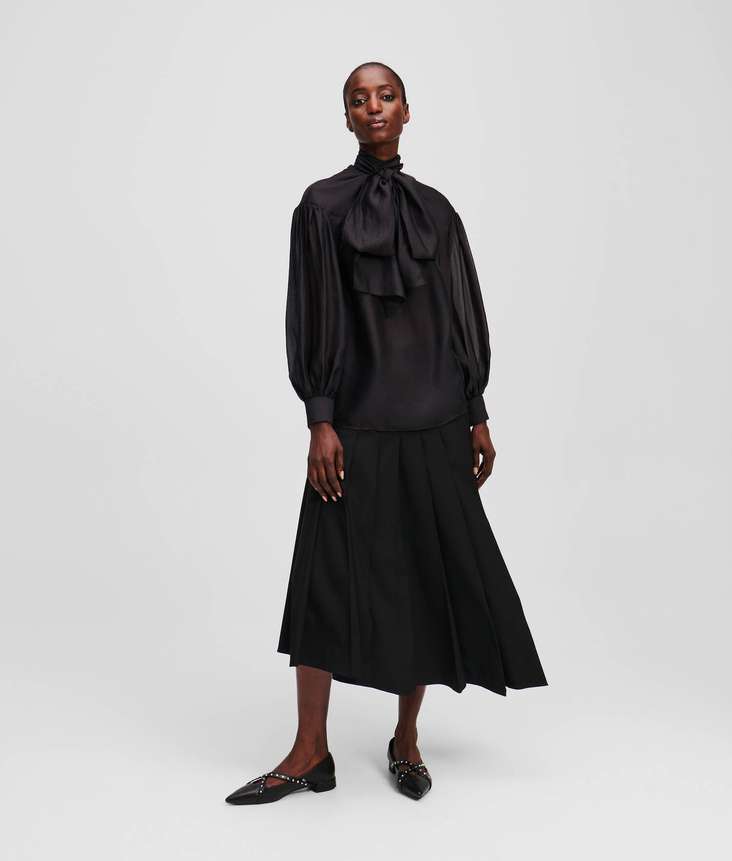 JUPE PLISSÉE ASYMÉTRIQUE