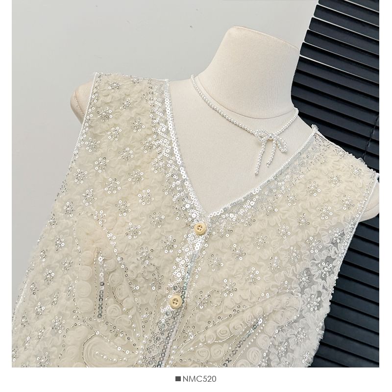 Lemongrass - Mesh vest met pailletten en knoopjes