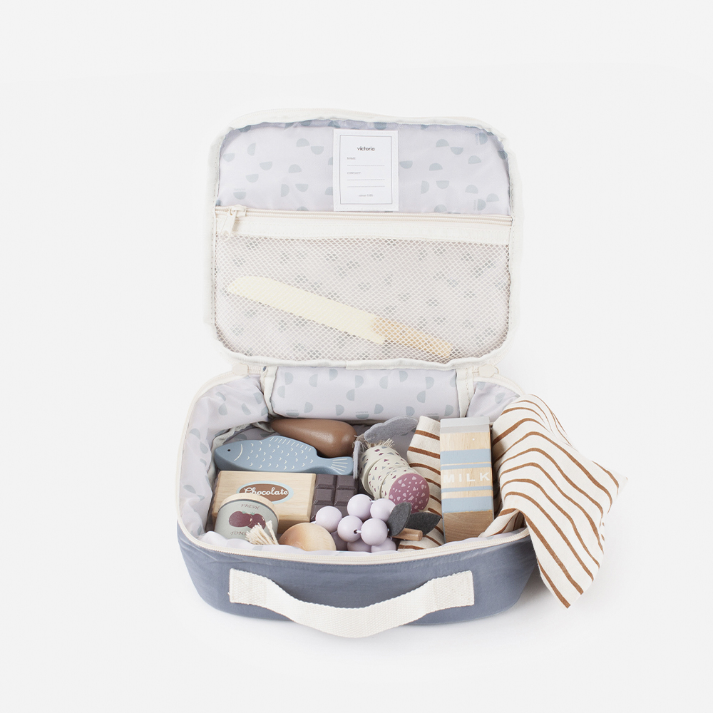 Bolsa térmica V. Things em nylon acolchoado com fecho de zíper e alça superior.