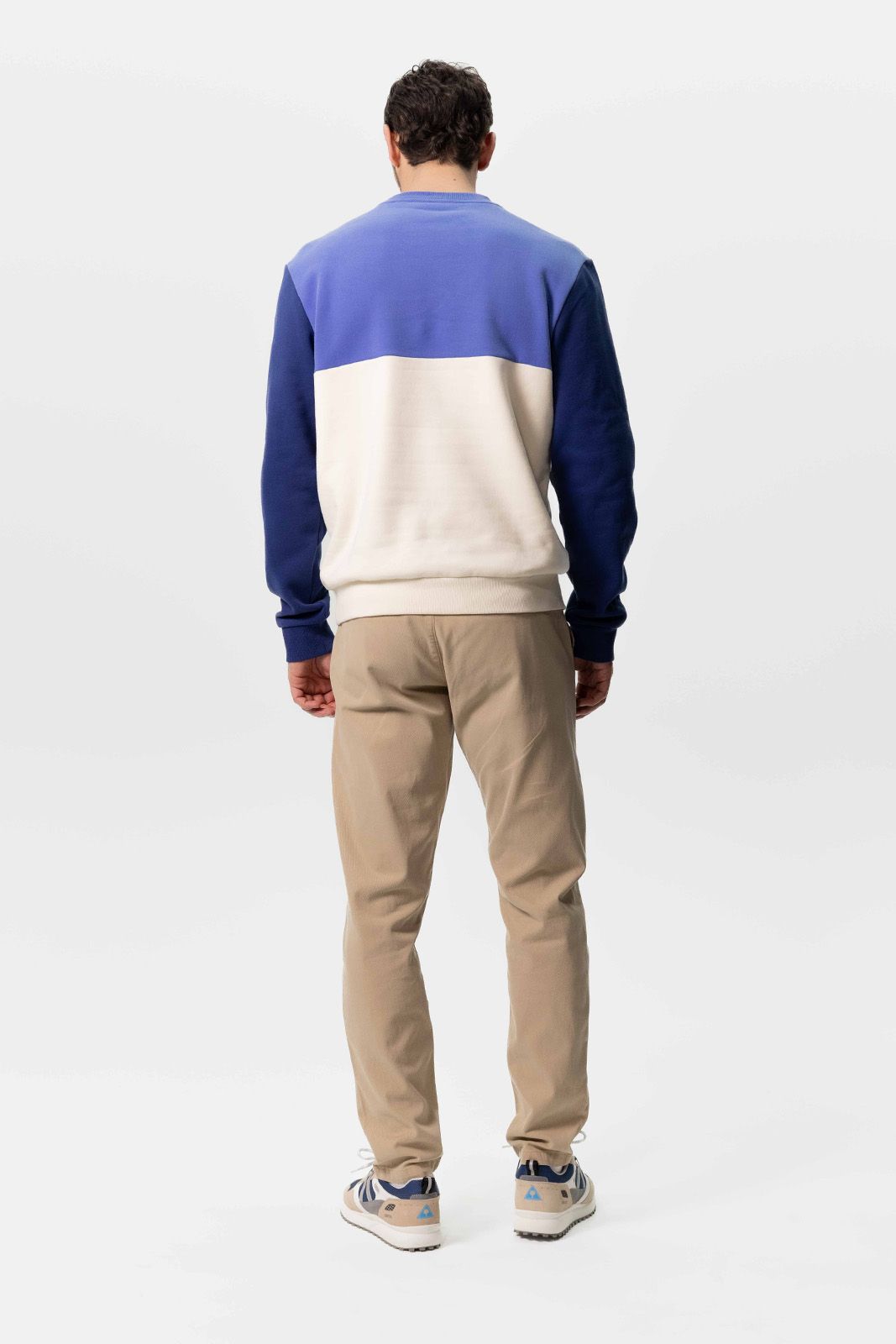 Blauwe colourblock sweater met artwork