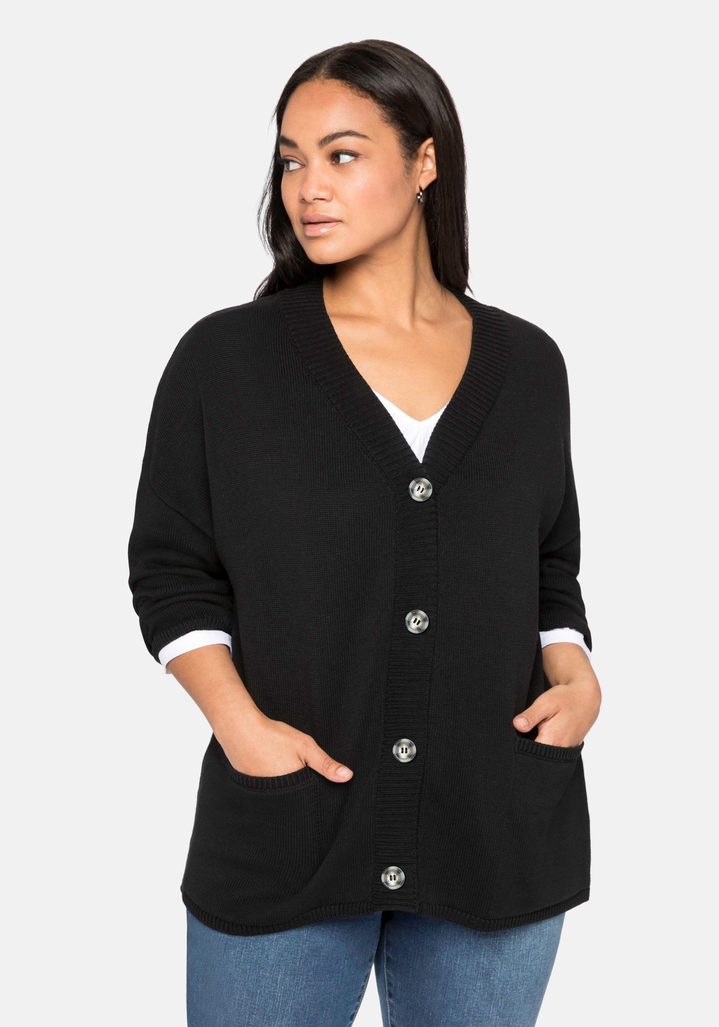 Strickjacke in Kurzform mit großen Taschen