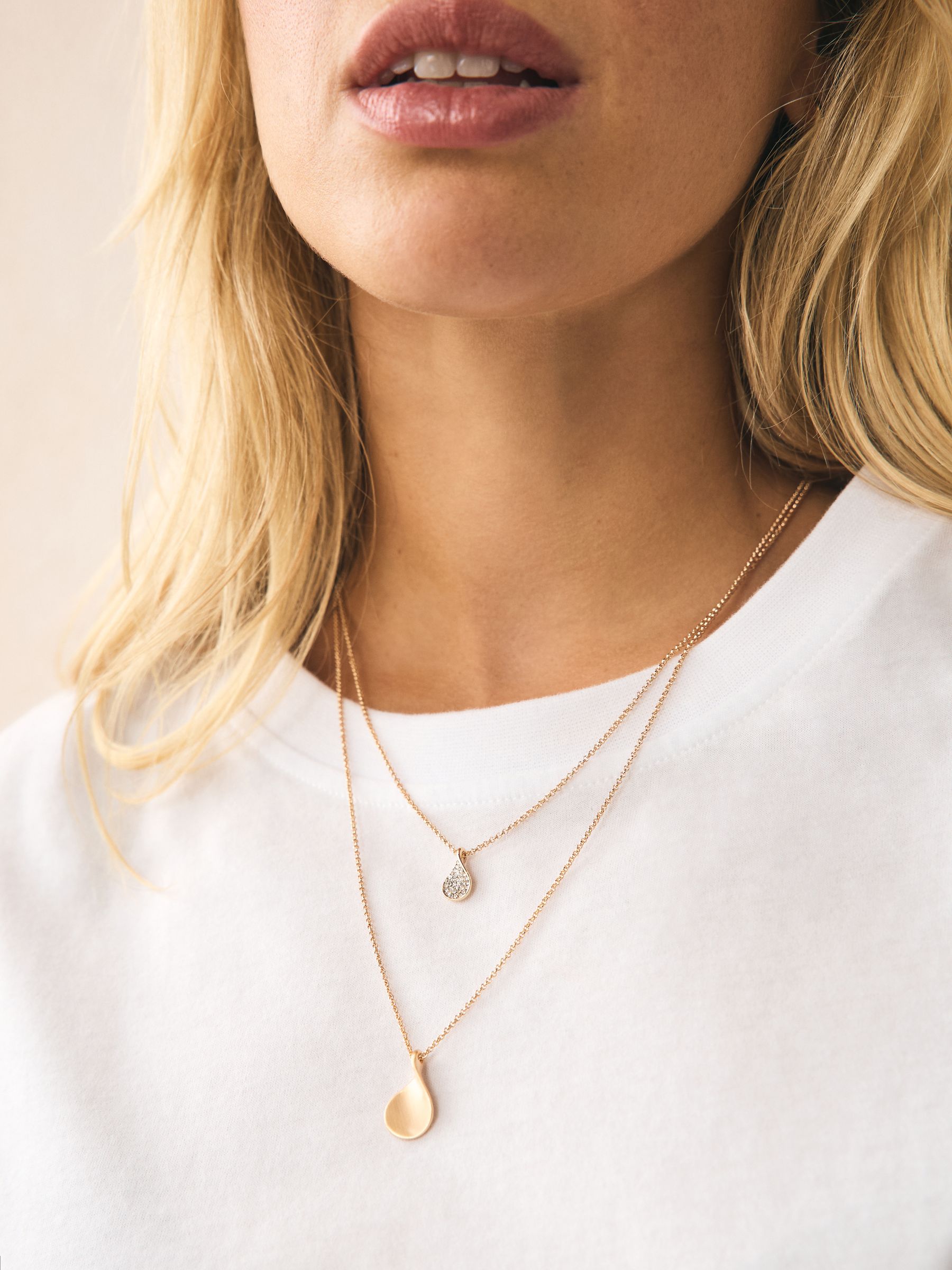 Goudkleurig - Gelaagde ketting met glinsterende blaadjes