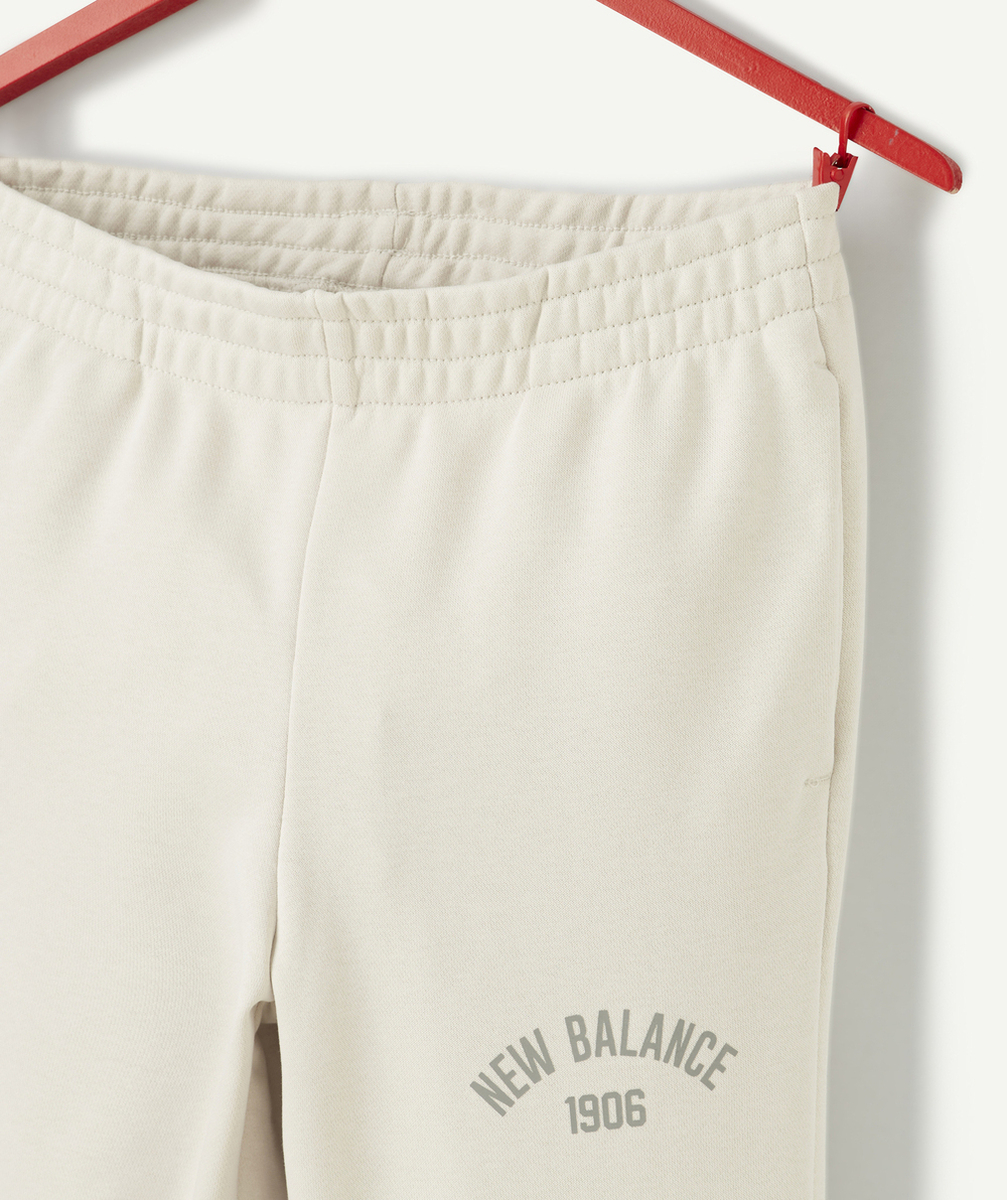 NEW BALANCEJOGGING ESSENTIALS VARSITY BLANC CASSÉ FILLE